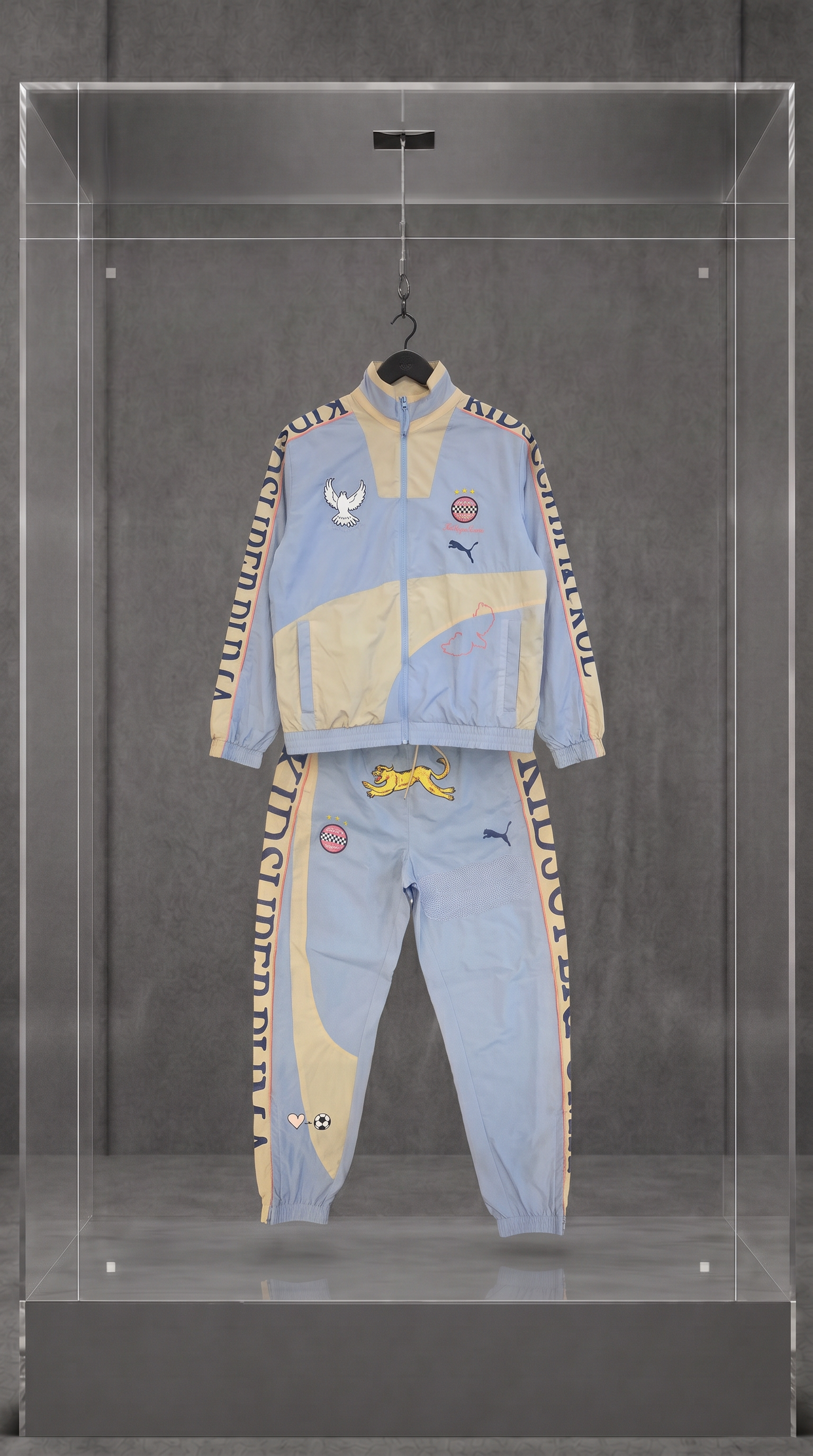 PUMA × KIDSUPER STUDIOS Conjunto Track (jaqueta + calça)
