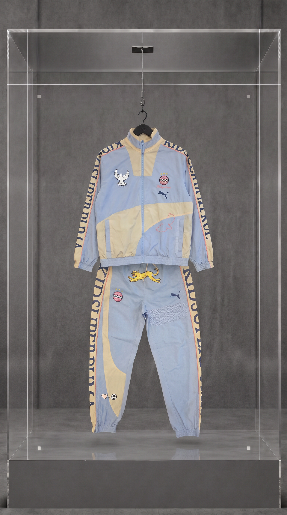 PUMA × KIDSUPER STUDIOS Conjunto Track (jaqueta + calça)