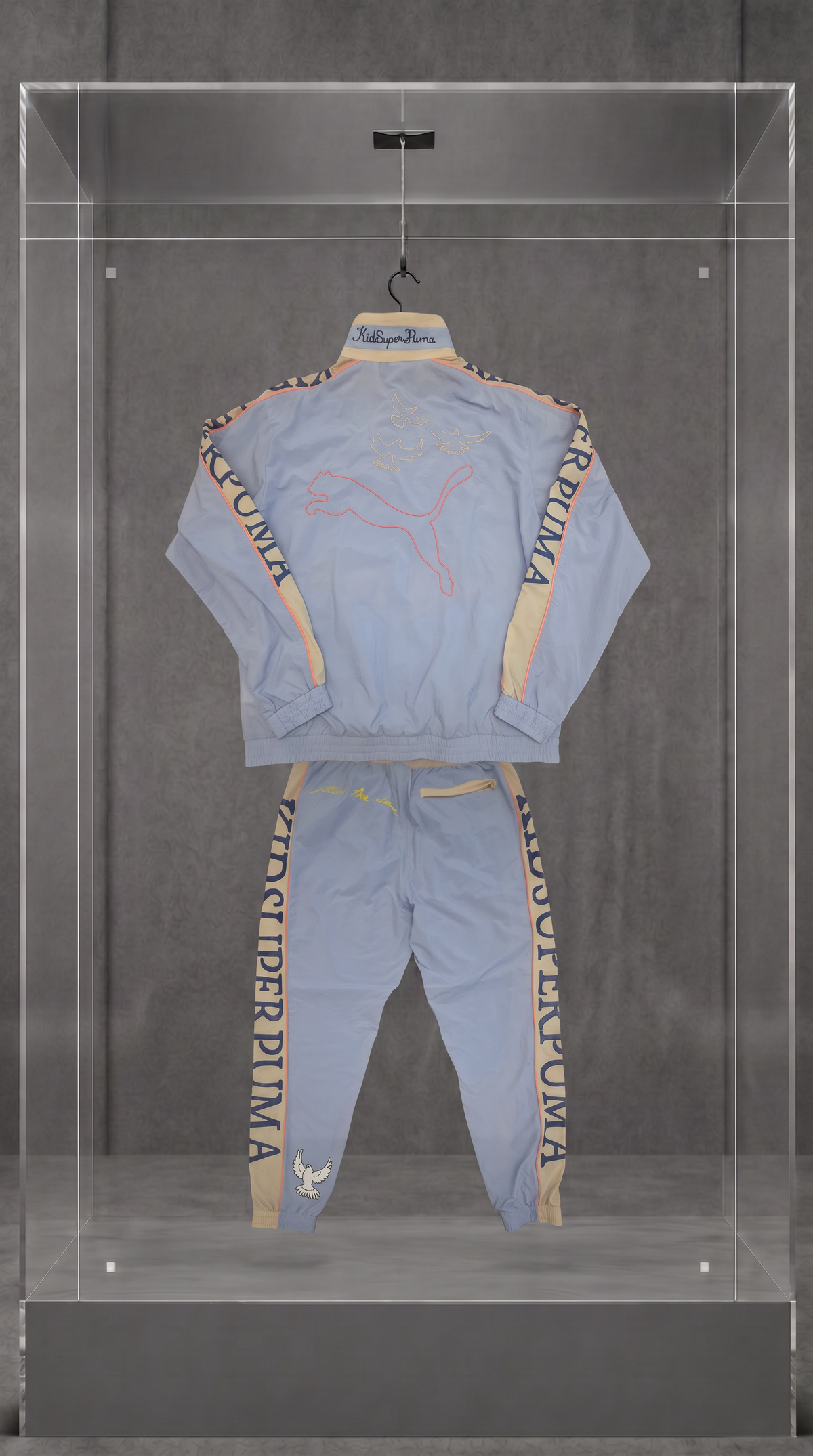 PUMA × KIDSUPER STUDIOS Conjunto Track (jaqueta + calça)